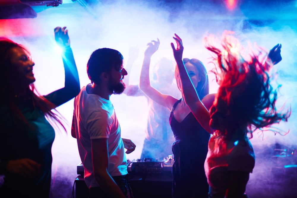kids dancing in the club possibly on drugs